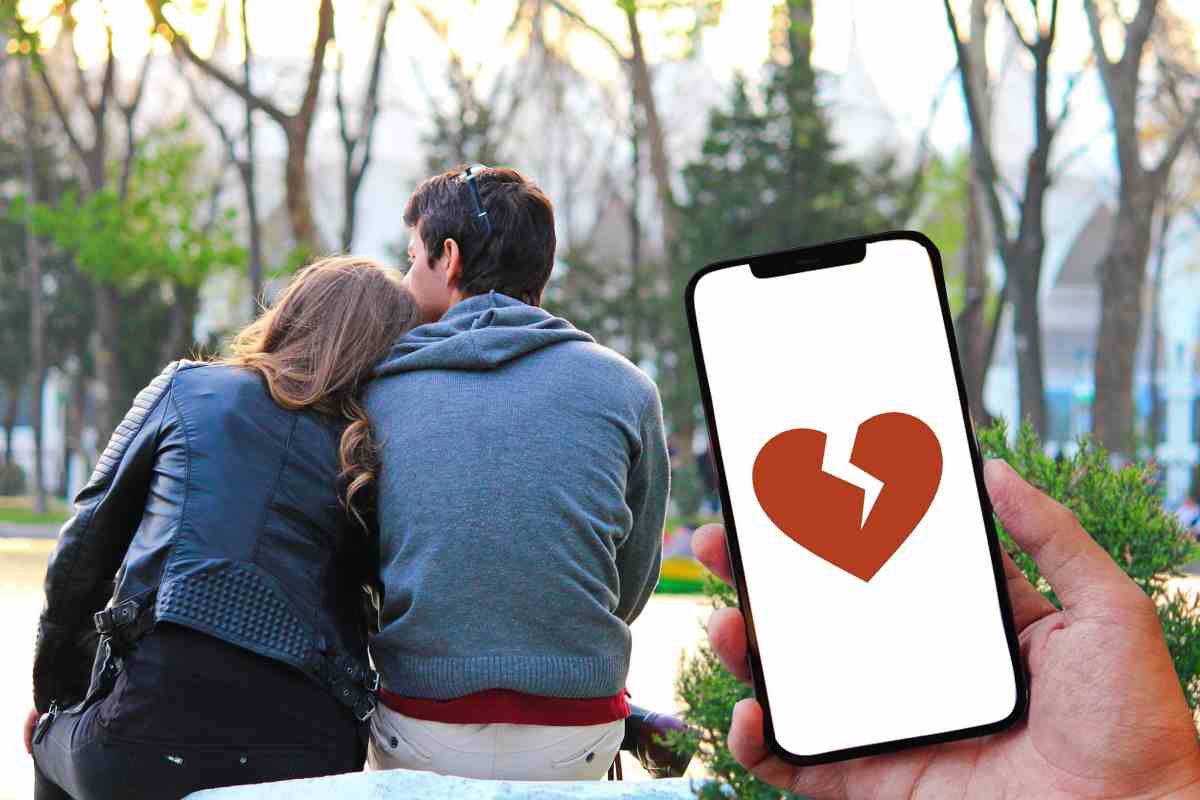Coppia che tradisce con smartphone con cuore spezzato