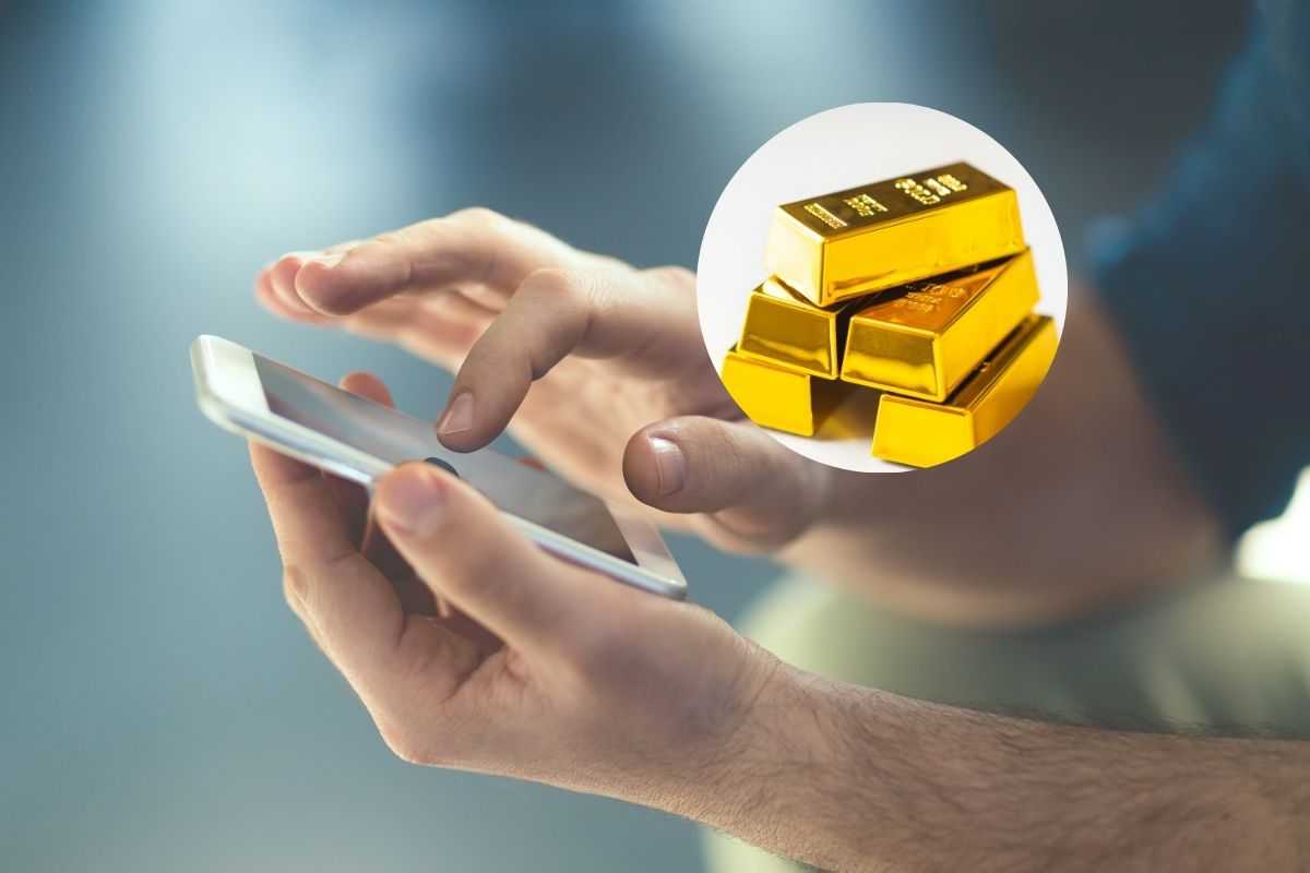 smartphone e nel cerchietto dei lingotti d'oro