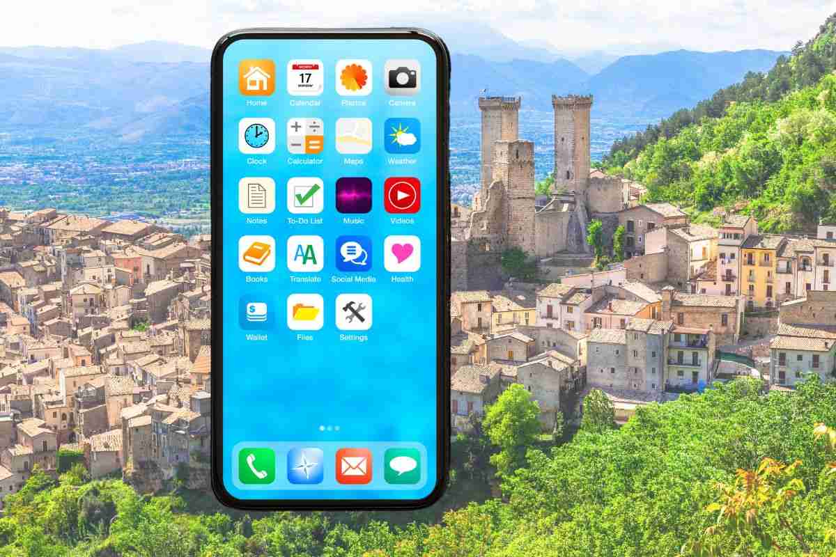 un paesino e uno smartphone in primo piano