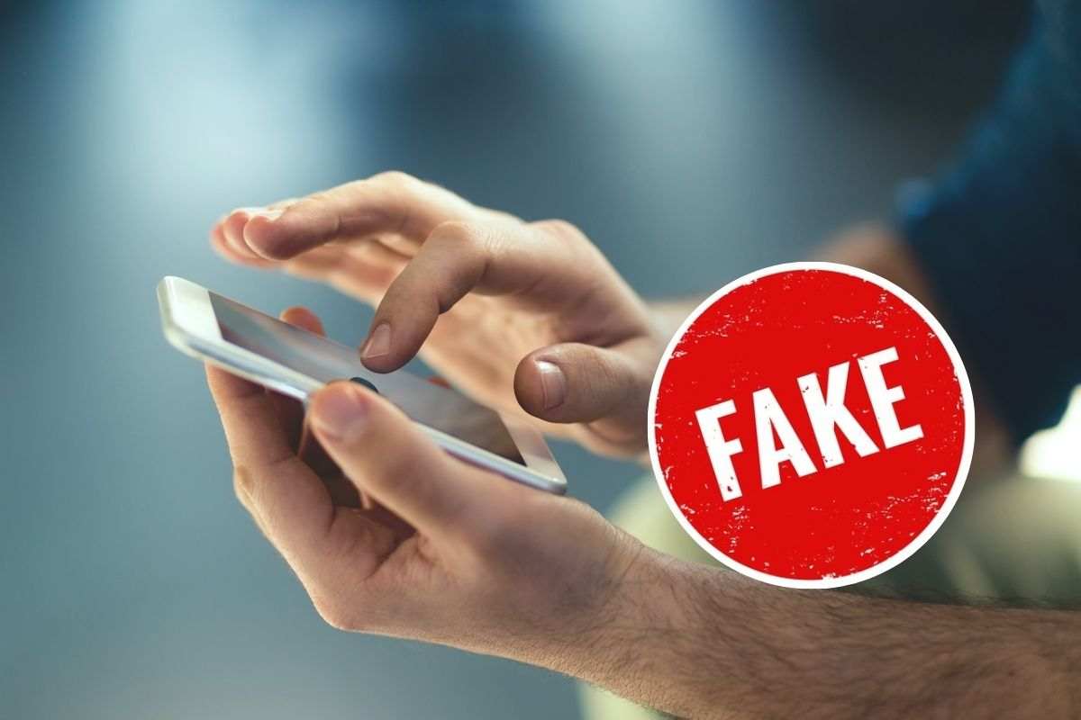 smartphone e nel cerchio Fake