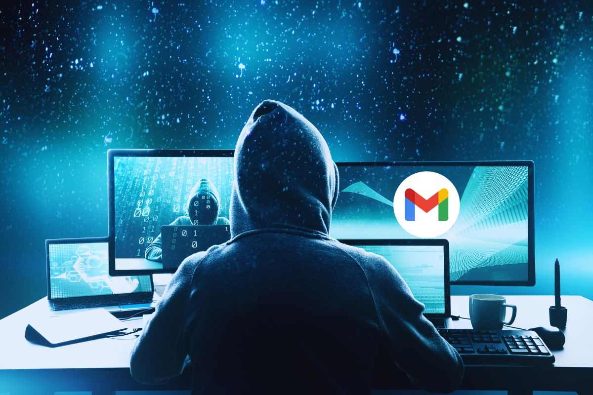 Hacker di spalle al computer e logo Gmail