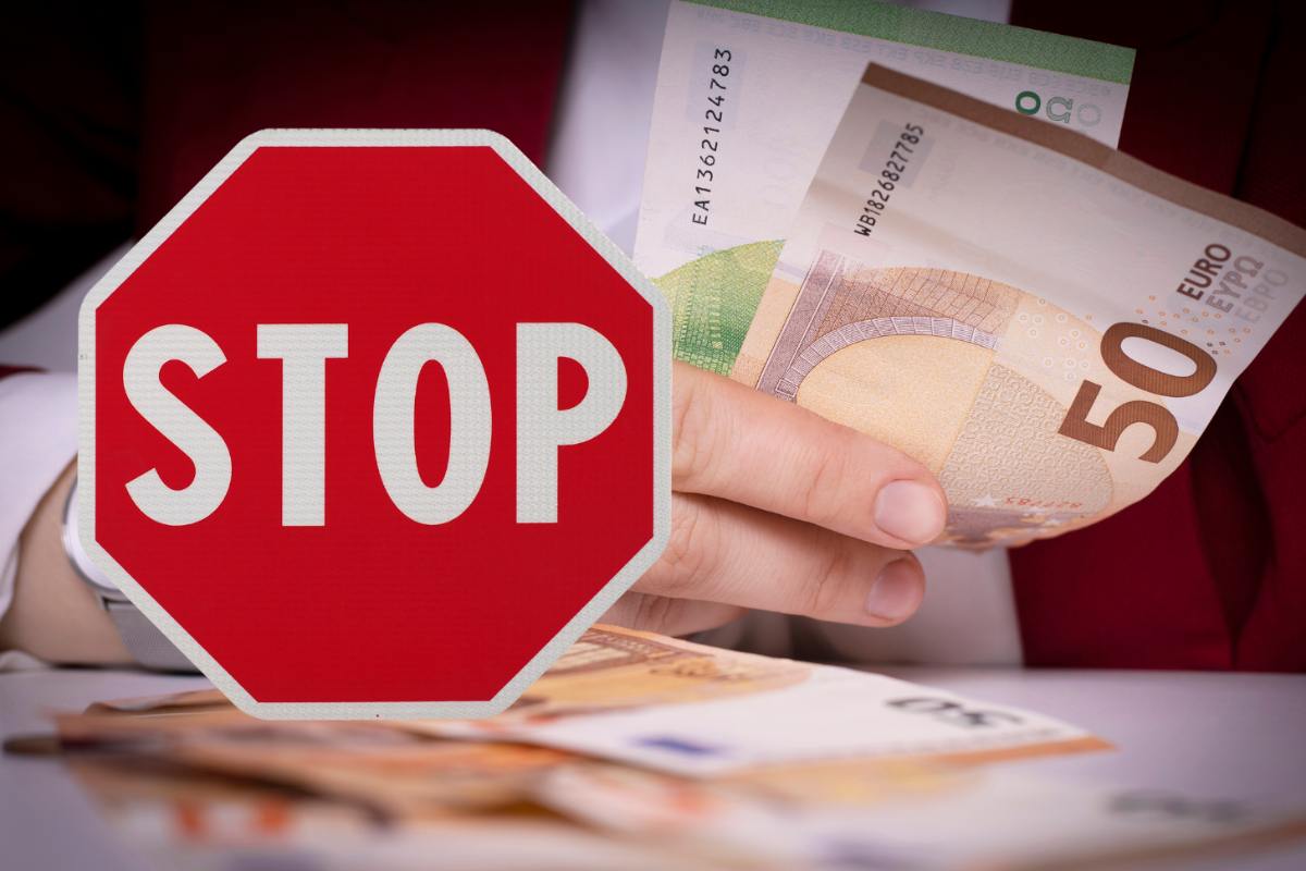 cartello di stop ed euro