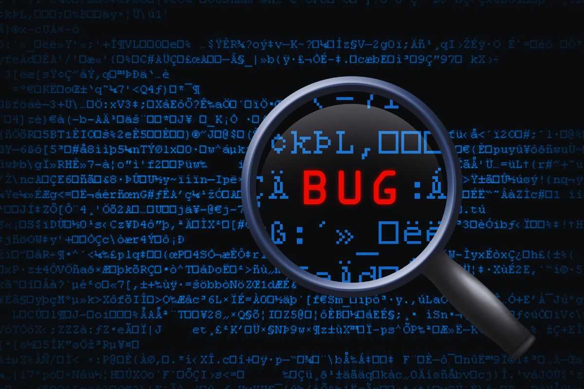Lente d'ingrandimento che evidenzia la scritta "Bug"