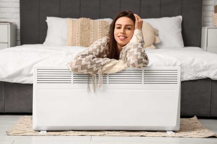 Donna con termoconvettore