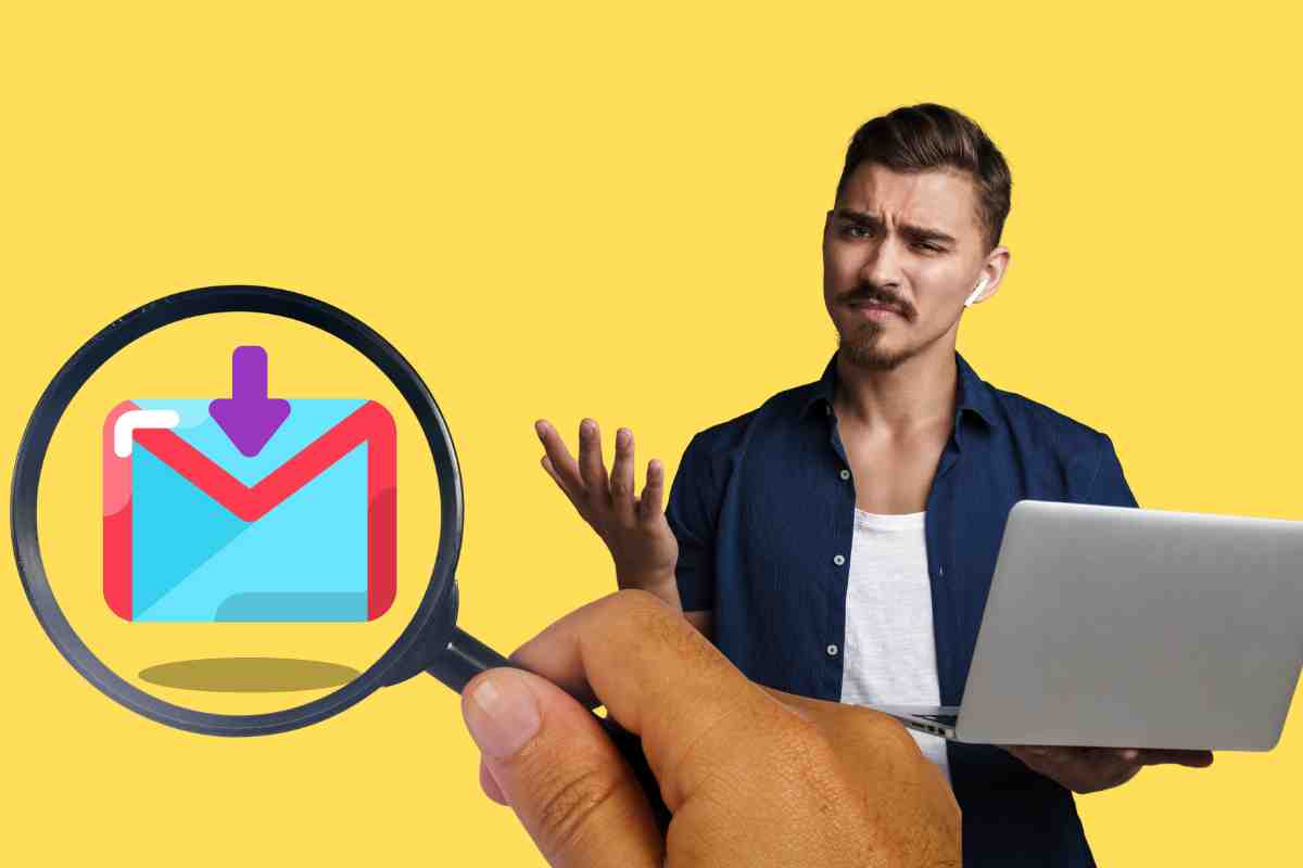 uomo sorpreso con pc e logo email sotto lente di ingrandimento