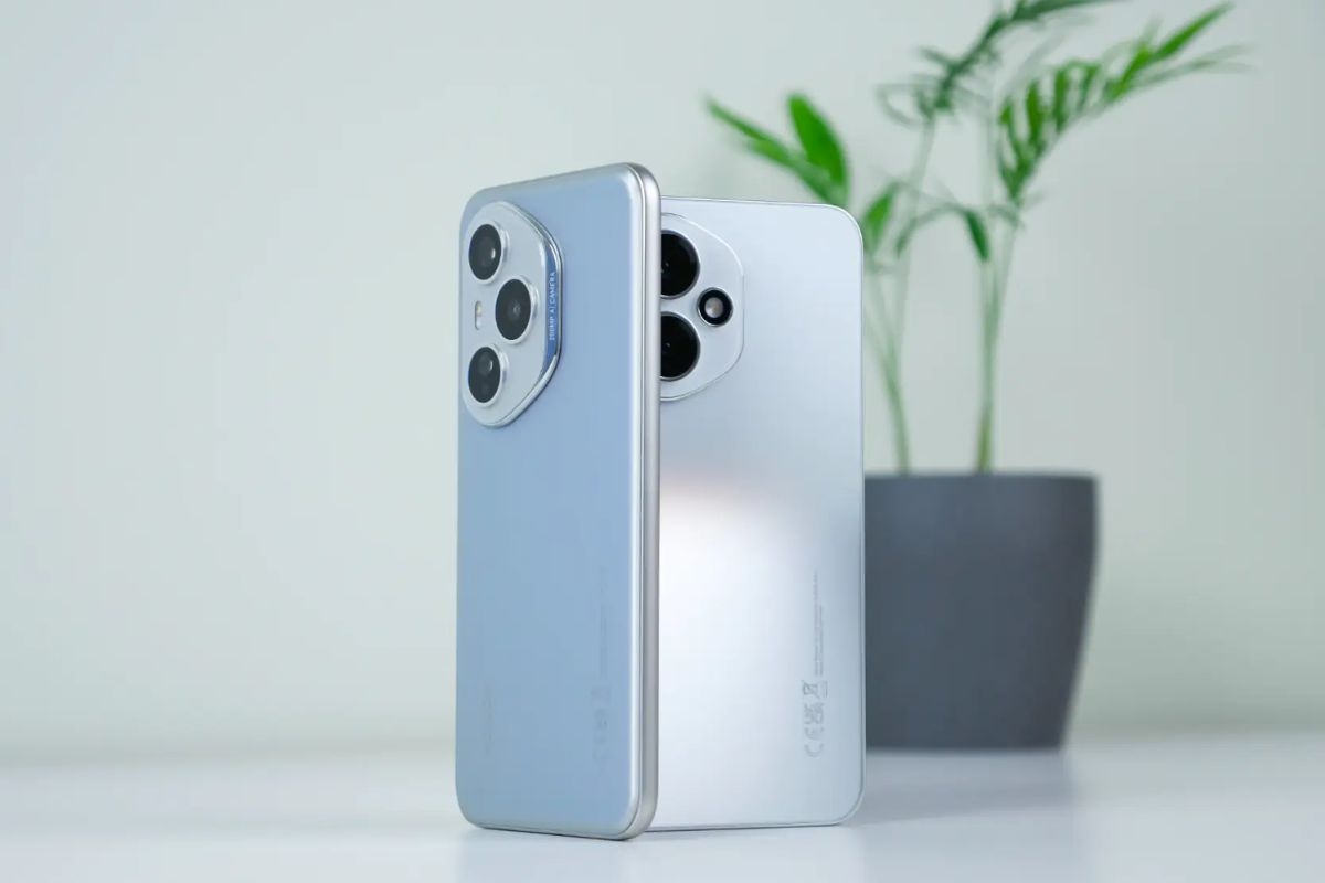 due smartphone honor girati con fotocamera in vista, pianta