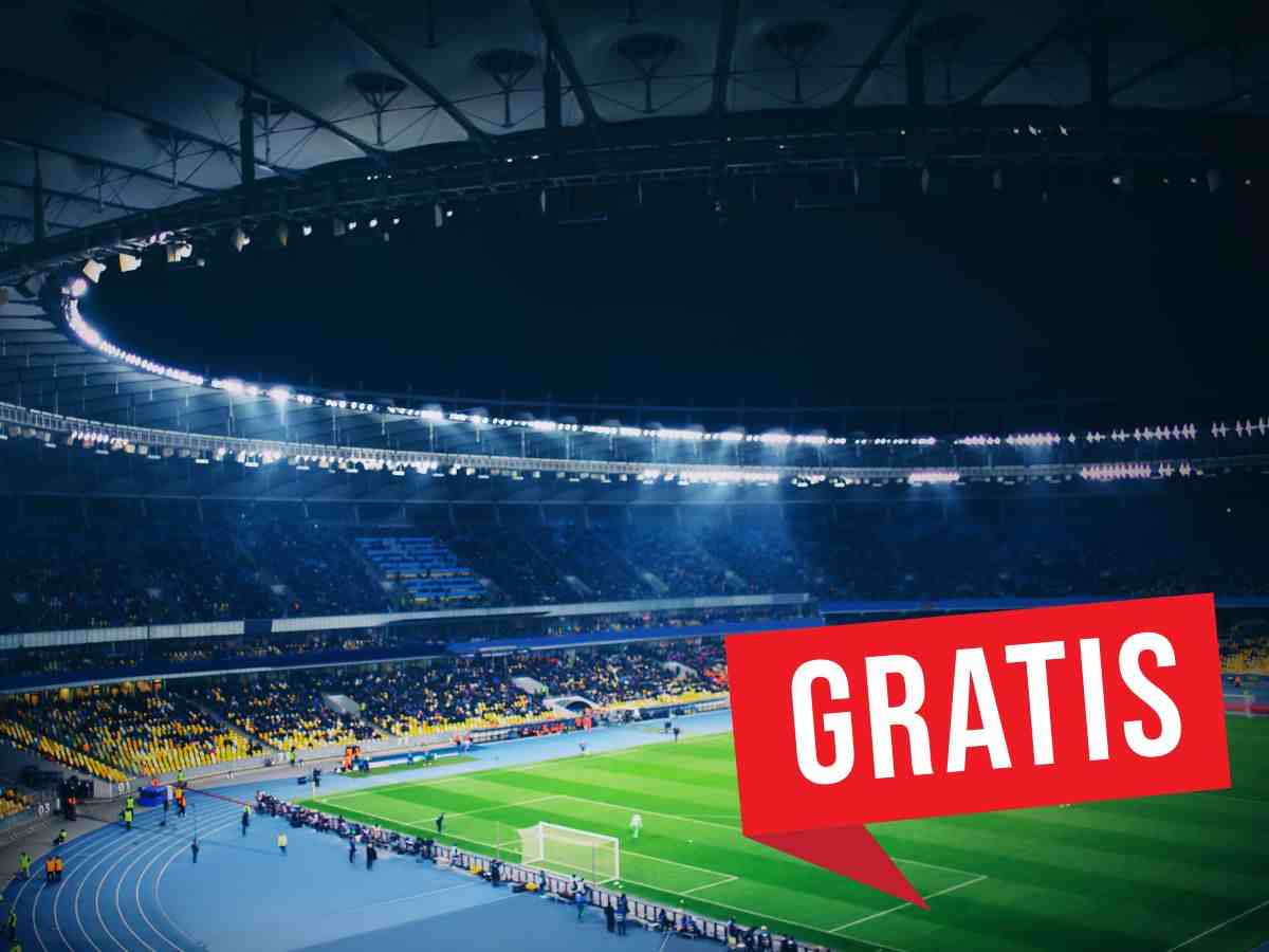 vista di uno stadio dall'alto in notturna con etichetta gratis